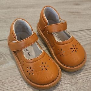 Brown Dress Shoes with Floral Cutouts and Adjustable Strap